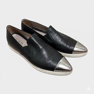 Miu Miu Black Leather Slip-On Sneakers with Silver Cap Toe